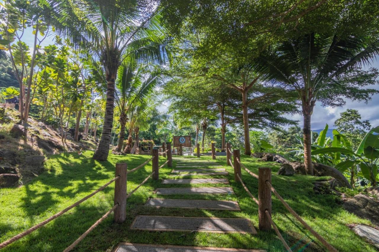 Kalima Resort&Spa - SHA Plus Patong Exterior foto The path to the temple